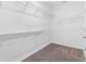 Spacious walk-in closet with ample shelving at 3212 77Th E Ct, Palmetto, FL 34221