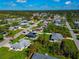 Aerial view of neighborhood with various house styles at 3363 Shamrock Dr, Venice, FL 34293