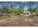 Inviting common area of the Meadows featuring seating areas and landscaped gardens at 3375 Sandleheath # 34, Sarasota, FL 34235