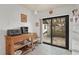 Bright breakfast area with a sliding glass door leading to the patio at 3375 Sandleheath # 34, Sarasota, FL 34235