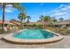 Community pool provides a relaxing retreat with lounge chairs and clear blue water, perfect for sunny days at 3375 Sandleheath # 34, Sarasota, FL 34235