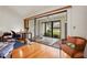 Bright sunroom with sliding glass doors leading to the outdoor area at 3375 Sandleheath # 34, Sarasota, FL 34235