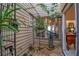 Enclosed courtyard with potted plants and access to interior at 3410 Avenida Madera # B, Bradenton, FL 34210