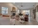 Cozy living room featuring a fireplace and sliding glass doors at 3410 Avenida Madera # B, Bradenton, FL 34210