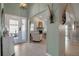 Open entryway with views into the living room and hallway at 3410 Avenida Madera # B, Bradenton, FL 34210