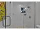 Updated bathroom with a walk-in shower and pebble-stone flooring at 3410 Avenida Madera # B, Bradenton, FL 34210