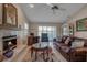 Relaxing living room with a fireplace and comfortable seating at 3410 Avenida Madera # B, Bradenton, FL 34210