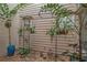 Private courtyard with gravel, plants, and a metal trellis at 3410 Avenida Madera # B, Bradenton, FL 34210