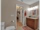 Updated bathroom with granite vanity and neutral color scheme at 3410 Avenida Madera # B, Bradenton, FL 34210