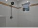 Updated shower with bright white tiles and modern fixtures at 3410 Avenida Madera # B, Bradenton, FL 34210