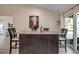 Kitchen island with granite countertop and seating at 3410 Avenida Madera # B, Bradenton, FL 34210