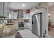 Modern kitchen with stainless steel appliances at 3410 Avenida Madera # B, Bradenton, FL 34210
