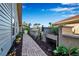Landscaped walkway with brick pavers and tropical plants at 3410 Avenida Madera # B, Bradenton, FL 34210