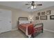 Charming bedroom with a metal bed frame and decorative artwork at 3410 Avenida Madera # B, Bradenton, FL 34210