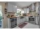 Modern kitchen with stainless steel appliances at 3410 Avenida Madera # B, Bradenton, FL 34210