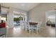 Dining area features a view of the lanai and pool area with easy access to the main bedroom at 4135 Dover E Dr, Bradenton, FL 34203
