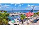 Boats docked at a marina with palm trees at 4713 Stafford Ct, Palmetto, FL 34221