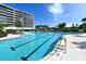 Inviting swimming pool with clear water and plenty of space at 535 Sanctuary Dr # C807, Longboat Key, FL 34228