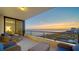 Private balcony with ocean view and comfortable seating at 535 Sanctuary Dr # C807, Longboat Key, FL 34228