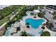 Resort-style pool with ample deck space and lounge chairs at 535 Sanctuary Dr # C807, Longboat Key, FL 34228