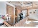 Common area coffee bar with granite countertop and coffee machine at 535 Sanctuary Dr # C807, Longboat Key, FL 34228