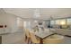 Elegant dining room with a marble table and ocean view at 535 Sanctuary Dr # C807, Longboat Key, FL 34228