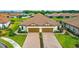 Two-unit home with two-car garages and a brick driveway at 5431 Taliaferro Ct, Palmetto, FL 34221