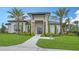 Community clubhouse with welcoming entrance and landscaping at 5431 Taliaferro Ct, Palmetto, FL 34221
