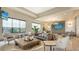 Clubhouse lounge with comfortable seating and large screen TV at 5431 Taliaferro Ct, Palmetto, FL 34221