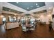 Spacious community room with comfortable seating and tables at 5431 Taliaferro Ct, Palmetto, FL 34221