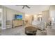 Spacious living room with large TV and comfortable seating at 5431 Taliaferro Ct, Palmetto, FL 34221