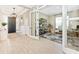 Bright and airy entryway with tile flooring, leading to an office and living areas at 6249 Mesa Gln, Bradenton, FL 34203