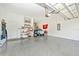 Spacious garage with epoxy flooring and storage at 6249 Mesa Gln, Bradenton, FL 34203