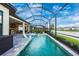 Relaxing screened pool and patio area with lake views at 6249 Mesa Gln, Bradenton, FL 34203