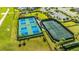 Aerial view of community tennis and pickleball courts at 6249 Mesa Gln, Bradenton, FL 34203