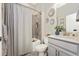 Clean bathroom with a shower/tub combo and modern vanity at 6249 Mesa Gln, Bradenton, FL 34203