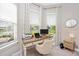 Bright home office with built-in desk and window views at 6249 Mesa Gln, Bradenton, FL 34203