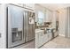 Sleek kitchen with stainless steel appliances and farmhouse sink at 6249 Mesa Gln, Bradenton, FL 34203