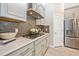 Modern kitchen features stainless steel appliances and a spacious island at 6249 Mesa Gln, Bradenton, FL 34203