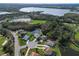 Aerial view of a house nestled in a golf community by the lake at 6637 Pleasant Hill Rd, Bradenton, FL 34203