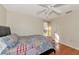 Bedroom with double bed and backyard access at 7115 39Th E Ln, Sarasota, FL 34243