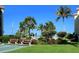 Shuffleboard court with benches and tropical landscaping at 8779 Midnight Pass Rd # 206H, Sarasota, FL 34242