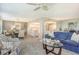 Open concept living and dining area with kitchen access at 8779 Midnight Pass Rd # 206H, Sarasota, FL 34242