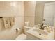 Updated bathroom with tile flooring and a modern vanity at 8779 Midnight Pass Rd # 206H, Sarasota, FL 34242
