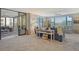 Spacious living room with access to balcony and comfy seating at 8779 Midnight Pass Rd # 206H, Sarasota, FL 34242