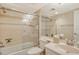Clean bathroom with a bathtub and shower at 8779 Midnight Pass Rd # 206H, Sarasota, FL 34242