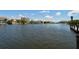 Serene waterfront view of the community at 8779 Midnight Pass Rd # 206H, Sarasota, FL 34242