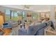 Open living area with ample natural light and stylish furnishings at 8779 Midnight Pass Rd # 206H, Sarasota, FL 34242