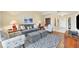 Bright living room featuring comfortable seating and stylish decor at 980 Cooper St # 302, Venice, FL 34285