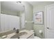Small bathroom with a single sink and shower/tub combo at 980 Cooper St # 302, Venice, FL 34285